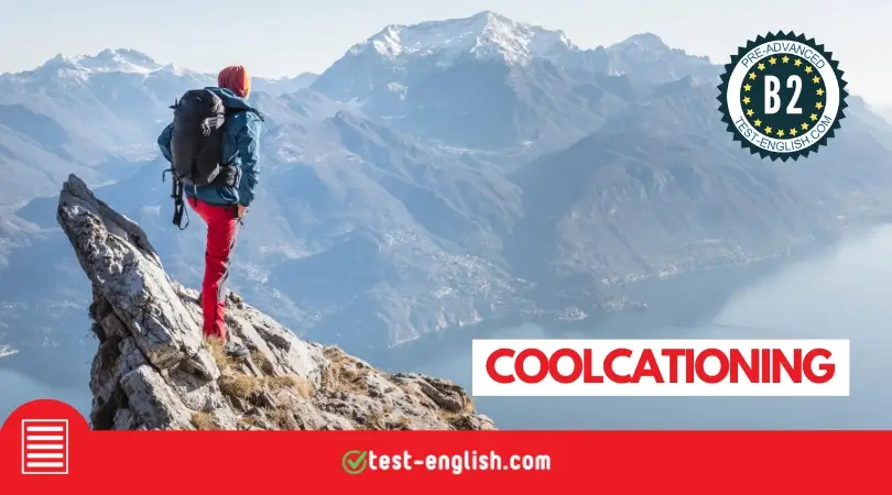 A hiker standing on a mountain peak overlooking a lake, for a B2 reading test about coolcationing and climate-conscious travel.