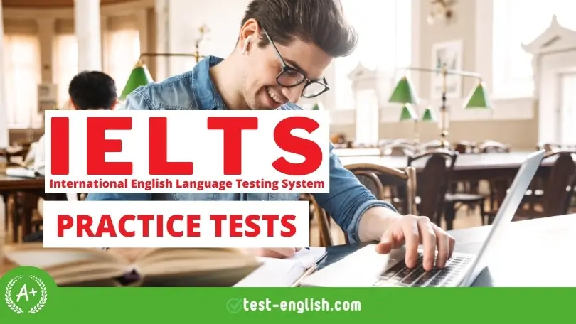 Smiling young man with glasses studying in a library, using a laptop with IELTS Practice Tests signage