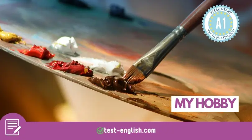 A paintbrush on a palette with colourful paints representing the theme of hobbies for A1 English writing practice.