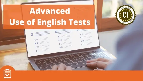Person completing C1 Advanced English Use of English test on a laptop to practise grammar and vocabulary online.